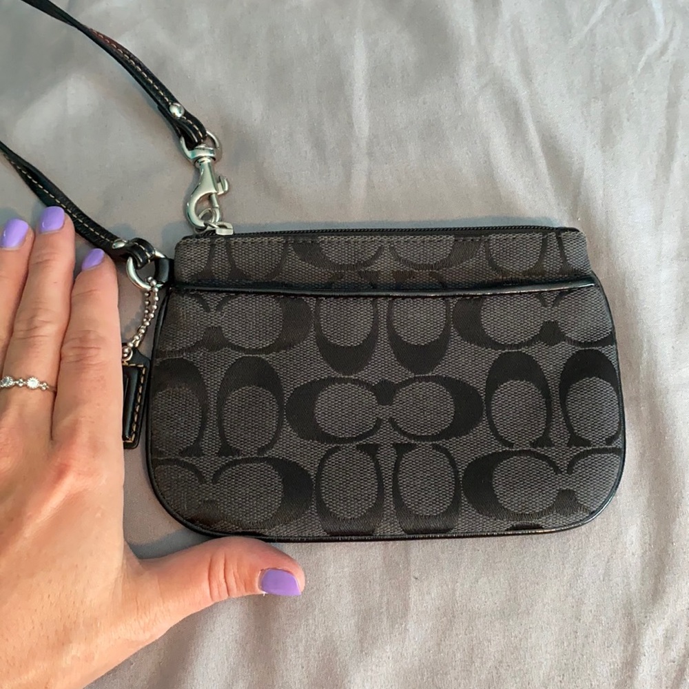 Black logo Coach wristlet